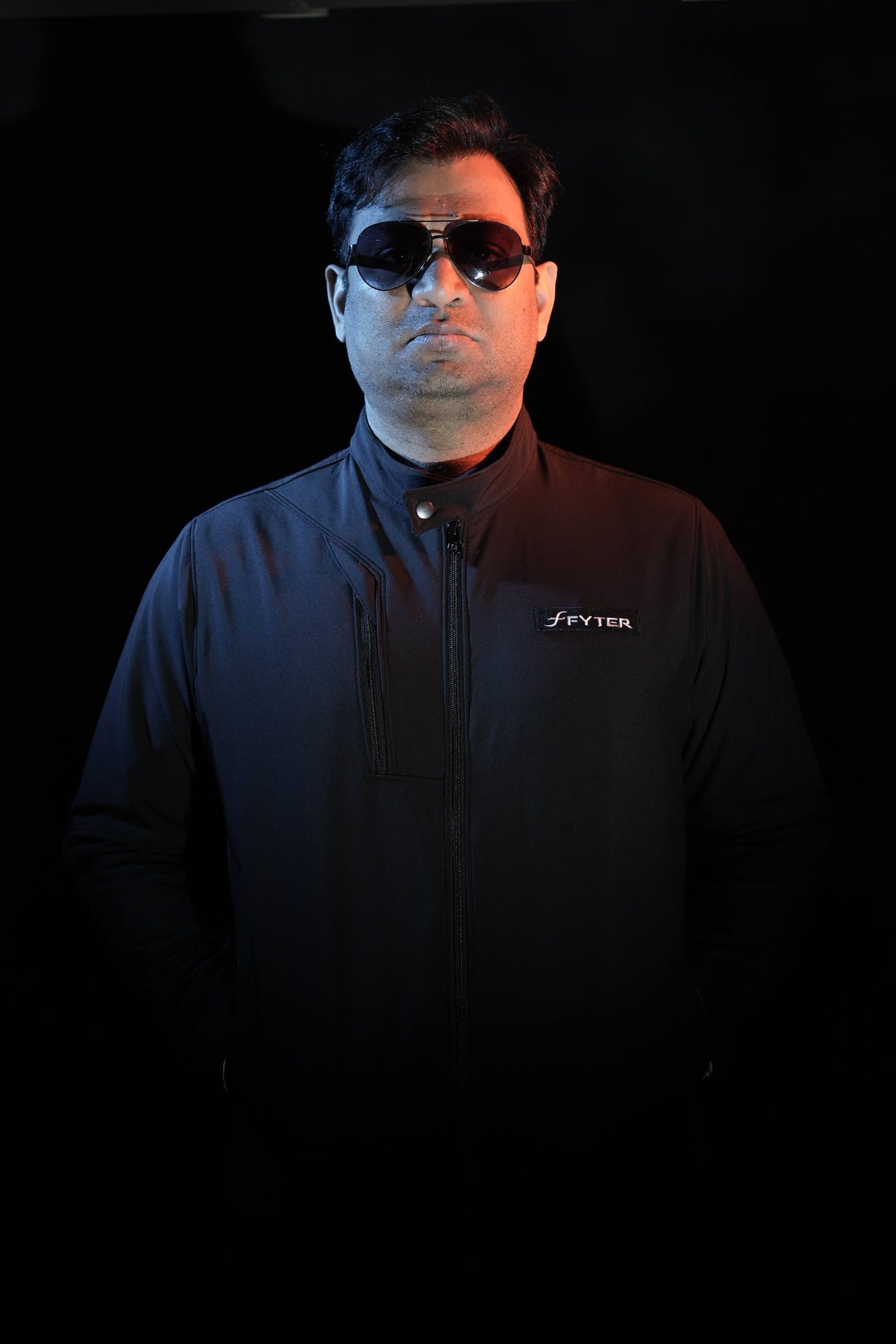 DJ Abdul facing the camera in sunglasses